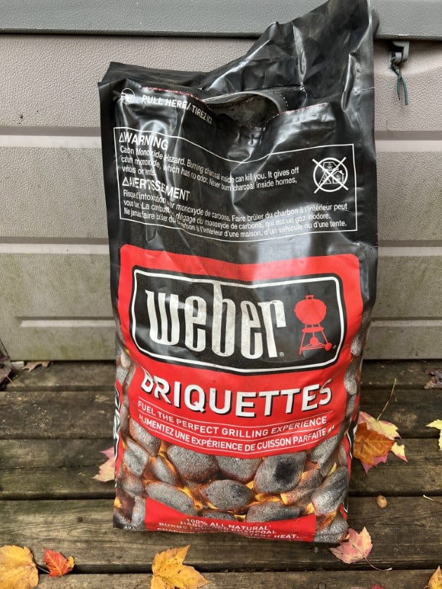 Bag of Weber charcoal briquettes.