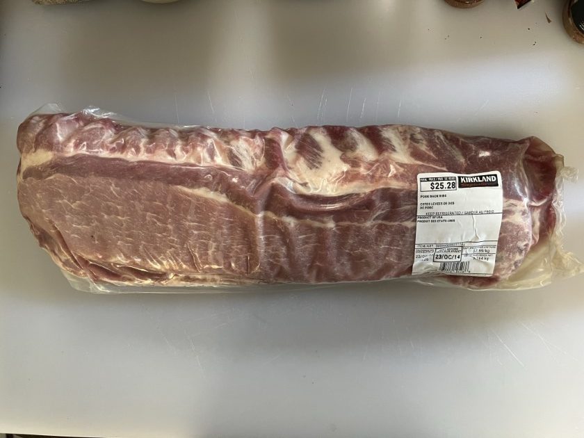Rack of Costco Kirkland ribs in a cryovac package.