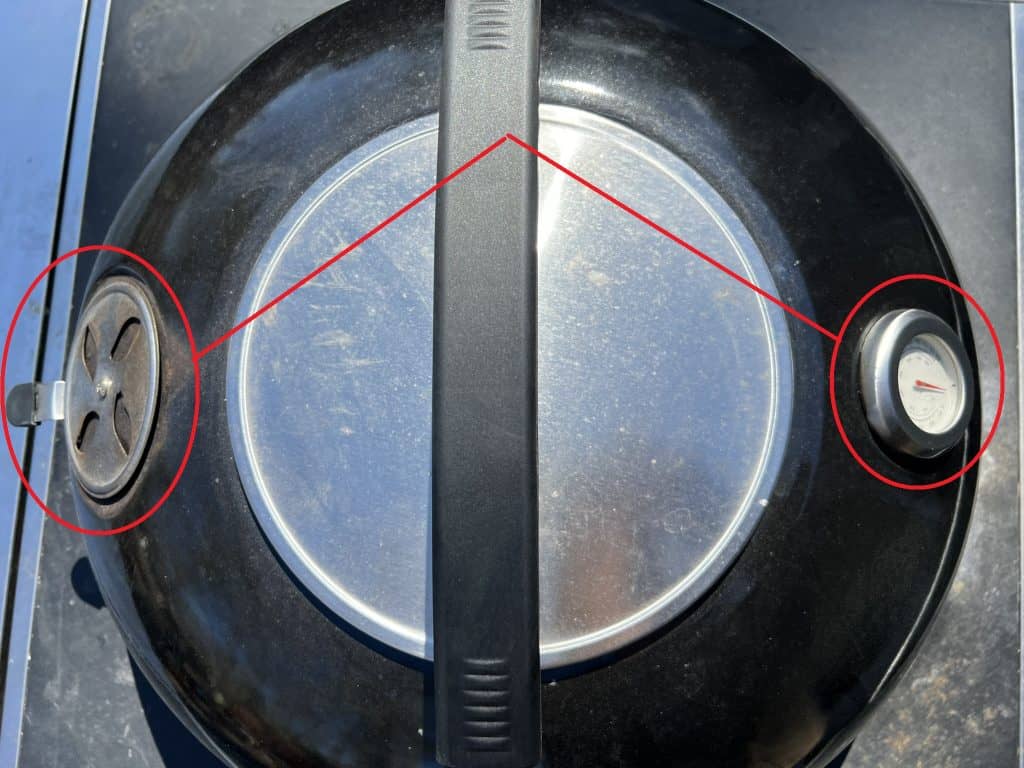 Weber Kettle lid showing vent and thermometer placement showing issues with the Weber Kettle grill thermometer.